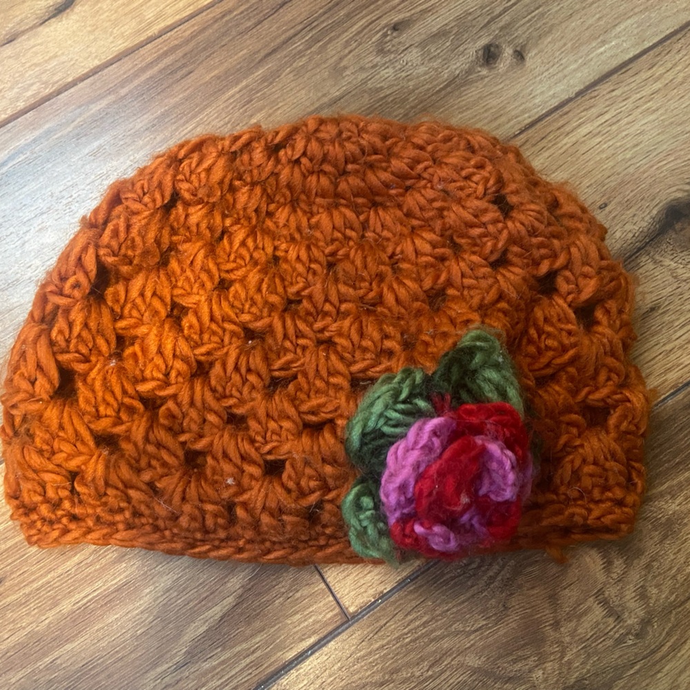 Handmade Orange Crochet Beanie with Floral Accent